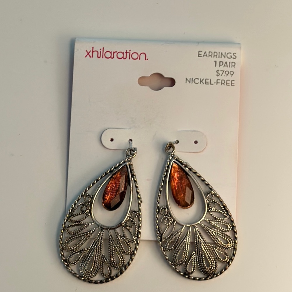 Xhiliration Teardrop Shaped Earrings Brushed Silver and Amber Color